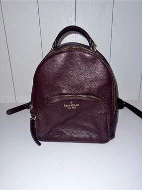 kate spade Mini Pebbled Leather Backpack in Burgundy